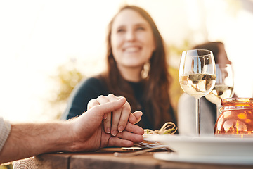 Image showing Holding hands, love and couple at a dinner celebration with support, care and trust on Christmas. Gratitude, kindness and man and woman with affection at a Thanksgiving lunch, party or gathering
