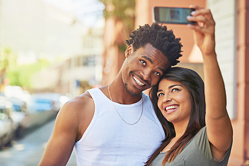 Image showing Couple, smile and phone selfie in city for summer vacation, travel adventure and fun together outdoor. Happy black man or woman with 5g mobile smiling for social media photo in Puerto Rico on holiday