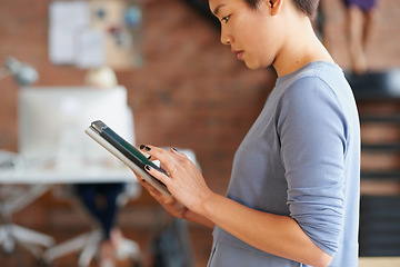 Image showing Business, asian woman and working on tablet in office for online networking, email communication or planning creative stratergy. Entrepreneur, startup tech stratergy and website ux design on ipad