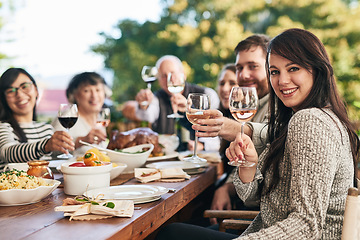 Image showing Family, portrait and wine toast, food and thanksgiving meal on patio by happy, smile and relax people. Happy family, cheers and buffet lunch celebration of tradition, holiday and social gathering