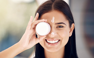Image showing Beauty, skincare and woman with cream on face, luxury glowing skin treatment and facial care. Health, wellness and anti aging routine, portrait of healthy and beautiful happy girl holding product.