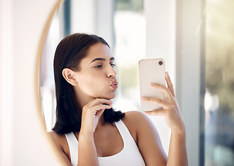 Image showing Selfie, phone and woman with mirror in bathroom for beauty, skincare and social media. Hygiene, self care and cleaning with girl and pout in reflection the morning for technology, mobile and internet