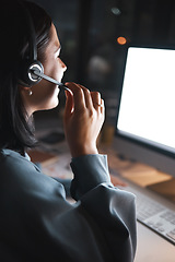 Image showing Business woman, consultant and call center in telemarketing, customer support or service for night at the office. Female employee agent in consultation, advice or hotline working the late shift