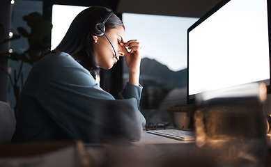 Image showing Call center, woman and headache on computer in night, overtime and stress, burnout and desktop glitch, pain and crisis. Frustrated, anxiety and tired sales consultant, pc web problem and dark company