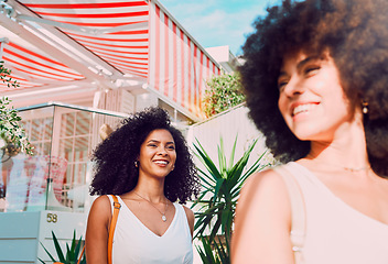 Image showing Black women, friends and happiness outdoor on vacation, travel and fun at holiday house in city for bonding on weekend. Smile, afro and young African females walking together and enjoying freedom