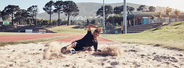 Image showing Athlete long jump, sand and sports man training for France olympic competition, workout challenge or fitness exercise. Winner mindset, commitment and athletics person working on leg power performance