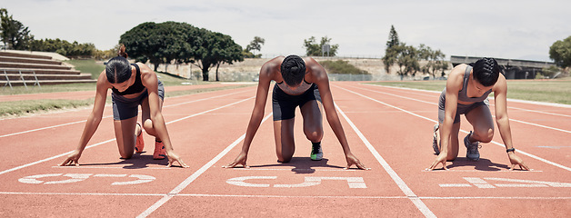 Image showing Race track, start and sports people at stadium for marathon competition, event and running with focus, energy and goal. Athlete or runner on field ground ready for speed contest or fitness challenge