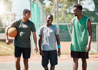 Image showing Black men, team building or bonding on basketball court in fitness break, workout or training in competition, game or match. Smile, happy or talking ball players, friends or community sports athletes