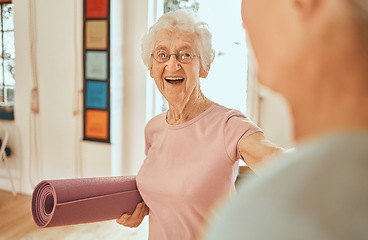 Image showing Yoga, fitness and workout with a senior woman holding an exercise mat in a class for wellness. Pilates, training and holistic with a mature female in a studio for mental health or lifestyle balance