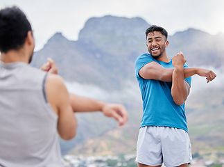 Image showing Stretching, fitness and friends ready for running on a mountain, training and marathon in nature. Health, happy and athlete men with a warm up before exercise, sports and workout in the mountains