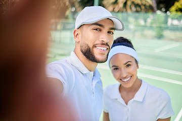 Image showing Tennis, portrait and couple take a selfie for a social media post on a social network app on a tennis court. Faces, fitness and happy woman with a smile enjoys training or workout with sportsman