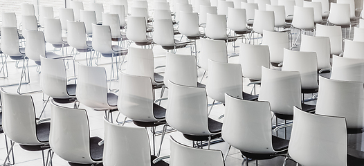 Image showing Empty white chairs in contemporary conference hall