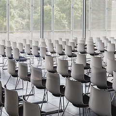 Image showing Empty white chairs in contemporary conference hall