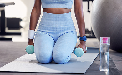 Image showing Fitness, healthcare and body of black woman with dumbbells training at gym for wellness. Sports, energy and female athlete or bodybuilder weightlifting for muscle, power or strength at fitness center