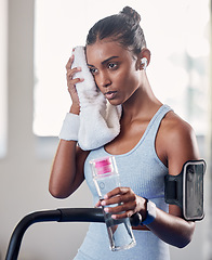 Image showing Black woman, gym and rest with towel for fitness, health and workout for strong body, muscle and focus. Woman, exercise and relax with cloth for sweat while training, running and cardio on treadmill
