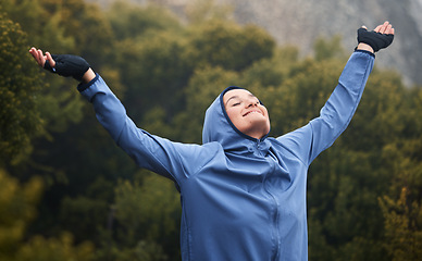 Image showing Fitness, peace and woman with gratitude, freedom and success with hands up in spiritual prayer or worship. Winter, forest and healthy girl with a happy smile after training or running in nature