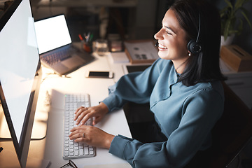 Image showing Call center, night and computer with woman in telemarketing communication, e commerce sales chat and insurance advisor smile. Monitor, office help desk or virtual IT support agent on pc screen typing