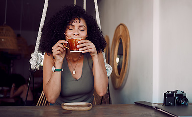 Image showing Black woman, coffee or tea to relax at a cafe for thinking, motivation and morning inspiration at a table of restaurant. Female customer smelling aroma of brazil roast or caffeine at coffee shop