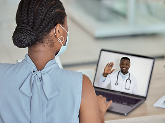 Image showing Covid, laptop and remote consultant with a doctor black man on a computer screen talking to a patient. Meeting, health and medicine with a woman on a video call with her male gp during corona virus