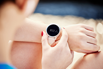 Image showing Watch, time and exercise with a sports woman tracking her workout progress with a fitness app closeup. Smartwatch, data and tracker with a female athlete or runner timing her training session