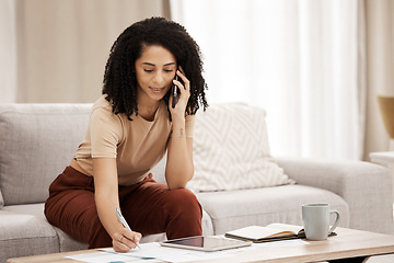 Image showing Phone call, documents and writing with a woman freelancer remote working from home on her startup business. Communication, coffee and technology with a female entrepreneur at work in the living room