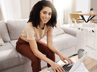 Image showing Portrait, woman and laptop on a sofa and freelancer working on financial planning, budget and sales review in a living room. Remote work, black woman and startup documents, online and search for idea