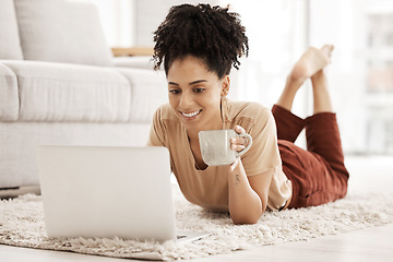 Image showing Computer remote work, black woman and living room floor with morning coffee working on an email. African woman happy on wifi, laptop and technology job online with a smile in a living room house