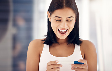 Image showing Excited, smile and woman with positive pregnancy test results with happy expression on face in bathroom. Family, love and pregnant girl with excitement for baby, child and future motherhood at home