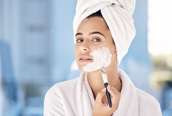 Image showing Woman, skincare brush and facial cream, portrait and cosmetic beauty routine. Moisturizer, health and model in morning face treatment to relax in home with towel, self care and cosmetic treatment