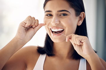Image showing Floss, teeth and dental with woman in bathroom for morning routine, oral hygiene and healthy gums. Wellness, cleaning and mouth with portrait of girl and big smile at home for cavity and toothcare