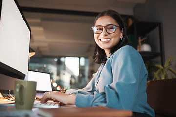 Image showing Space, computer and portrait of woman in office at night, working and research idea with mockup screen. Mock up, happy and businesswoman search online for creative design, inspiration and ppt review