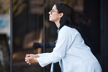 Image showing Healthcare, idea and balcony with a doctor woman thinking while working at the hospital for medical or insurance. Health, treatment and contemplation with a female medicine professional at work