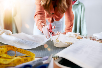 Image showing Fashion, designer and cutting fabric in workshop, woman working with scissors for dress making and manufacturing clothes. Clothing, designer and measuring tape with textile business and creative.