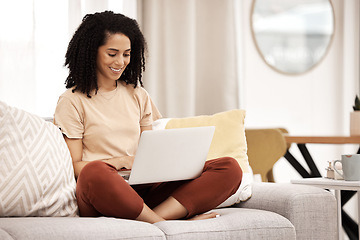 Image showing Black woman, working and laptop typing in a living room home doing happy work research. Remote freelancer working on web planning and digital marketing with a smile on a computer online in a house