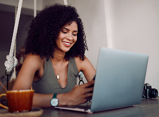 Image showing Phone, freelance photographer black woman in cafe and laptop typing on smartphone checking social media. Freelancer at remote work, reading good news email for creative project in coffee shop.