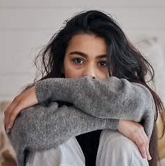 Image showing Face portrait, sad and woman with depression in home feeling lonely and unhappy. Anxiety, mental health and female in house alone depressed, suffering from bad relationship or loss, grief or break up