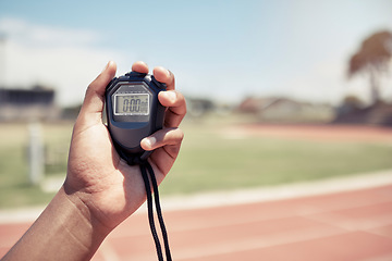 Image showing Sport, coach and closeup of hand with stopwatch for time, training and speed of athlete, runner or race. Mentor, trainer and digital clock, watch or timer for fast running on track, field or stadium