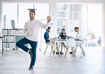 Image showing Business man, balance and multitask with laptop, book and coffee in hand while happy about workflow management in a marketing office. Portrait of employee mindset and mental health to study and work