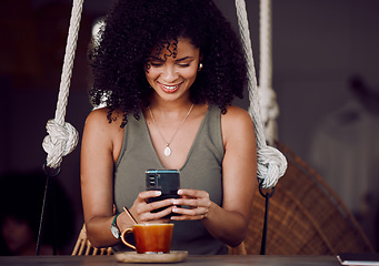 Image showing Coffee shop, online and black woman with coffee and phone in hand enjoy freedom, weekend and vacation. Happiness, relax and girl using smartphone for social media, typing message and internet in cafe