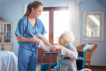 Image showing Senior woman, wheelchair and nurse for holding hands, disability support or nursing home. Elderly lady, doctor and consulting for help, advice or physiotherapy in elderly care, clinic or smile at job