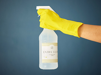Image showing Cleaner hand, glove and product for cleaning, hygiene and cleaning service with detergent advertising mock up. Eco friendly chemical, spray bottle with disinfectant and cleaning supplies.