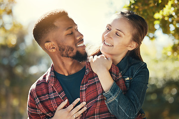 Image showing Nature, walking and diversity couple with outdoor adventure, travel and journey for wellness, love and support in summer bokeh. Happy black man with woman on piggyback ride for holiday, vacation date