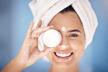 Image showing Skincare, cream and woman with product promotion, marketing or advertising for dermatology in face portrait. Facial, sunscreen or night cosmetics container and happy girl or beauty model in bathroom