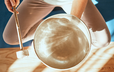 Image showing Meditation, wellness and person with Tibetan singing bowl for mindfulness, calmness and peace in yoga. Spiritual healing, exercise and top view of hands with bowl for sound therapy, harmony and zen