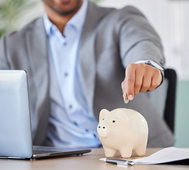 Image showing Piggy bank, savings and businessman with a coin for his investment budget planning for inflation crisis. Accounting, growth and hands of financial manager investing change with money management goals