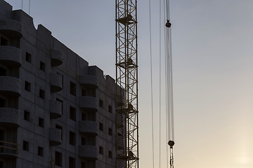 Image showing tall yellow construction crane