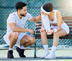 Image showing Tennis coach, man talking and woman athlete for motivation on tennis court, inspire and discuss tips for tired fitness, sports exercise and sport training. Coaching, match workout and game strategy