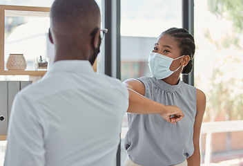 Image showing Business people, covid and elbow greeting for social distance or health and safety during pandemic at the office. Man and woman employee elbow bump with face masks for workplace rules and regulations