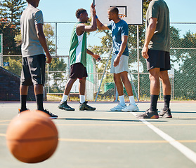 Image showing Basketball court, high five and motivation for team, teamwork and energy at sports game with black men or friends at community playground. Street ball people together at training for support outdoor