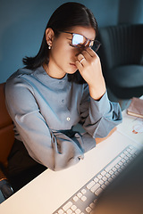 Image showing Stress, anxiety and burnout with a business woman at work on a computer at a desk in her office from above. Compliance, mental health and headache with a female employee struggling to make a deadline